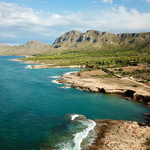 Wander sandy beaches and explore sheltered coves in Mallorca
