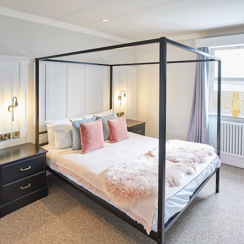 Wake up to seascapes from your king-sized bed