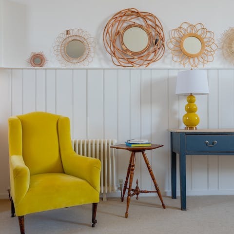 Lose yourself in a good book in the bright living room