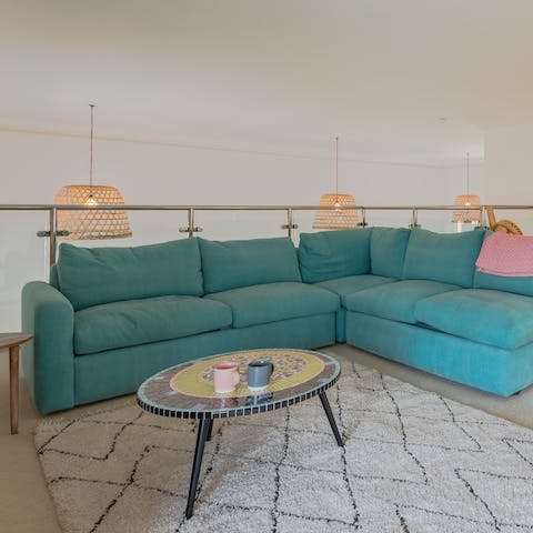 Curl up on the comfy sofa in the mezzanine