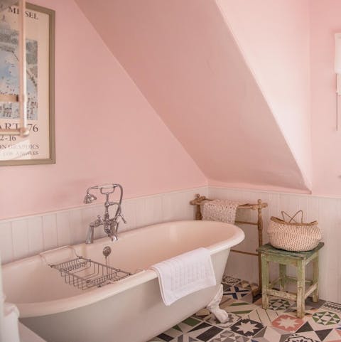 Take a soak in the freestanding bathtub