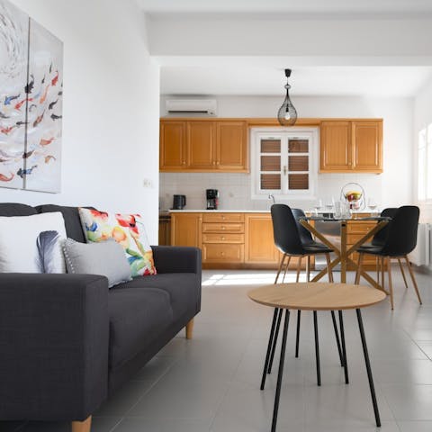 Nibble on olives and spanakopita in the open-plan living area