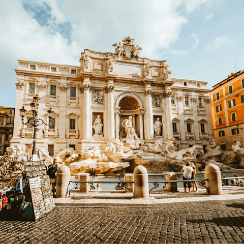 Begin your Roman holiday with a stroll to the Trevi Fountain