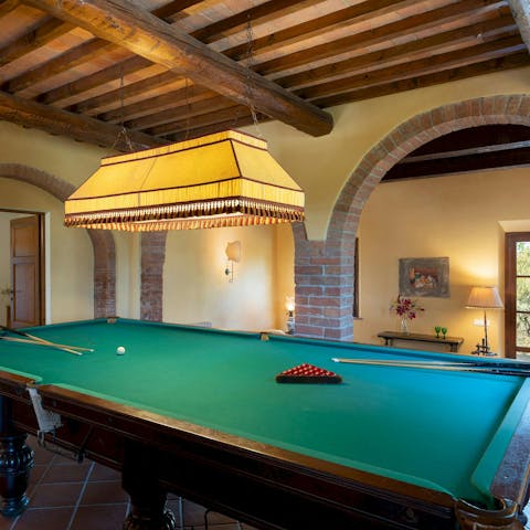 Play a game of snooker after a hike through the Tuscan countryside