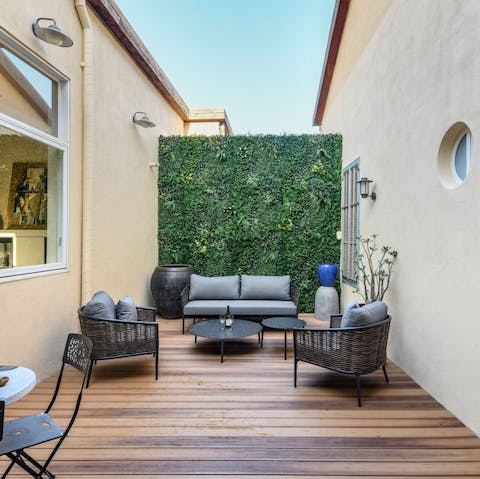 Retreat to the terrace after a busy day for moonlit drinks with your loved ones