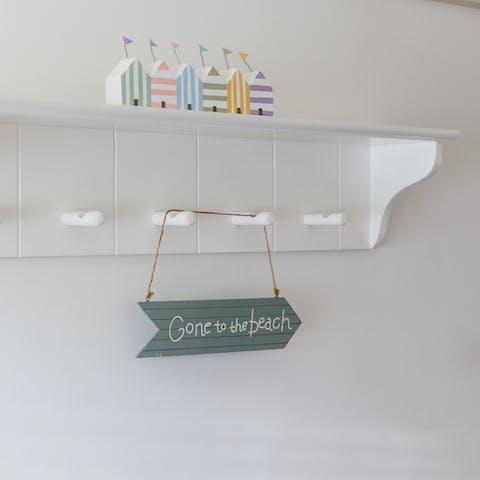 Admire the cute, beachy touches throughout the home