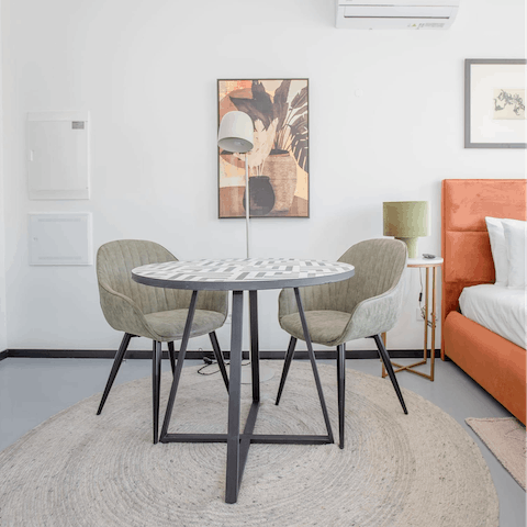 Start mornings with fresh coffee and pastéis de nata at the chic dining table