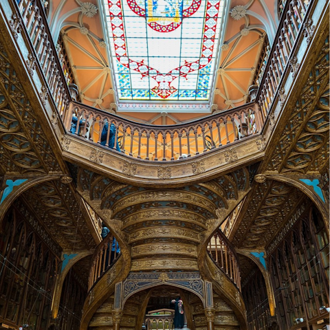 Admire Livraria Lello's ornate interiors, twenty minutes away on foot