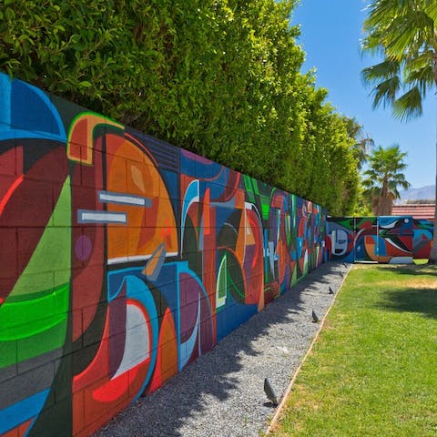 Snap a selfie in front of the graffiti wall