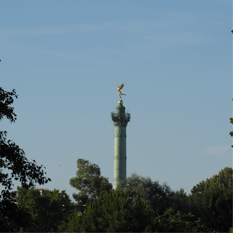 Visit Place de la Bastille, reachable on foot from home