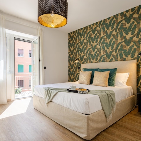 Open up the bedroom balcony doors and  let the sunshine in