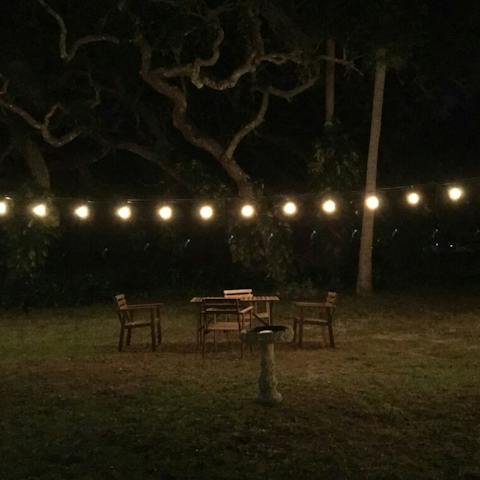 Sit under the string lights in the garden for magical evenings together