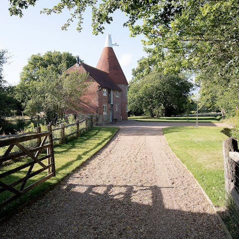 Travel up the private drive to this beautiful old oast house