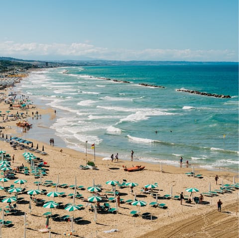 Dip your toes into the sea at Cala Piccola beach, only an eleven–minute drive away