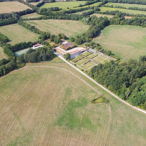 Wander the hundred-hectares of grounds, including the landscaped garden close to the home