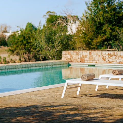 Cool off in the pool and enjoy the scent of the citrus grove