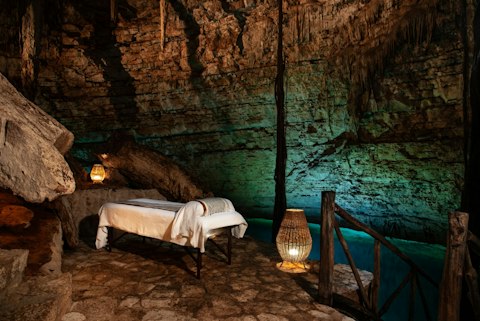Take a treatment beside glowing turquoise waters underground