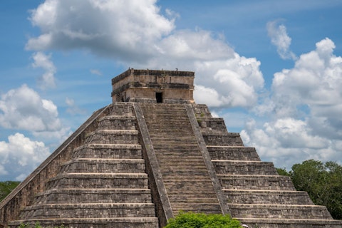Marvel at Chichén Itzá, a UNESCO World Heritage wonder, a forty-five-minute drive
