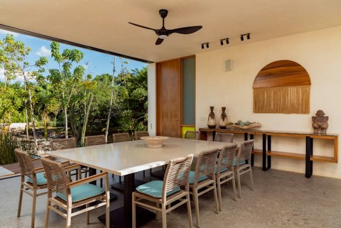 Gather the whole group for chef-prepared meals facing the jungle