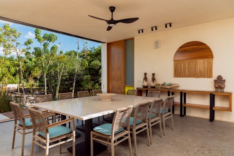 Gather the whole group for chef-prepared meals facing the jungle