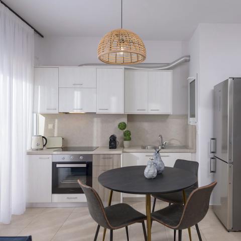 Tuck into breakfast around the dining table before packing your beach bag