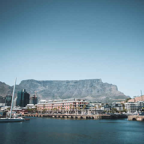 Stroll around the vibrant V&A Waterfront, a five-minute drive away