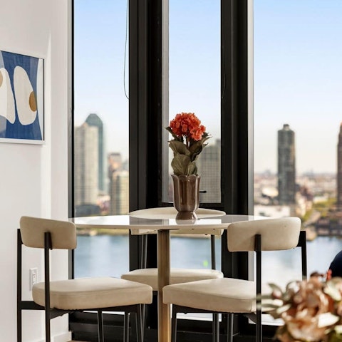 Drink in the city vistas from the dining table over coffee