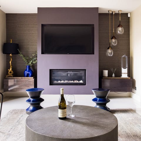 Unwind in the evenings with Netflix and a tipple in the cosy living room