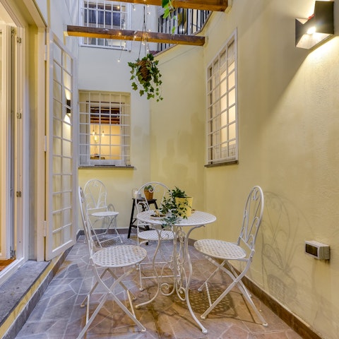 Enjoy an aperitivo on the indoor terrace