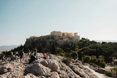 Marvel at the Acropolis of Athens crowning the city, a twenty-minute walk