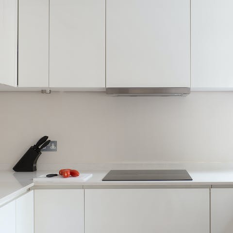 Prepare delicious home-cooked meals in the fully-equipped kitchen