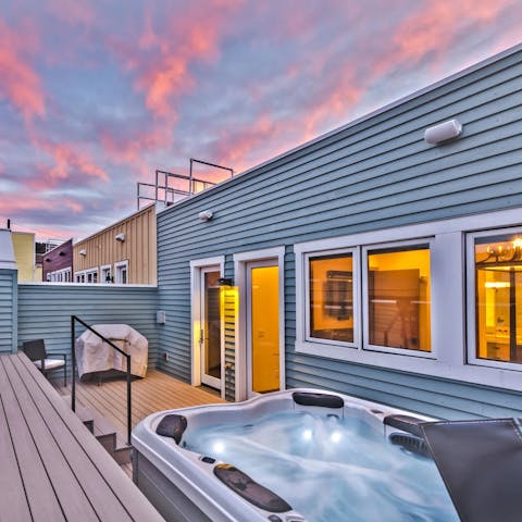 Unwind in the hot tub on the deck