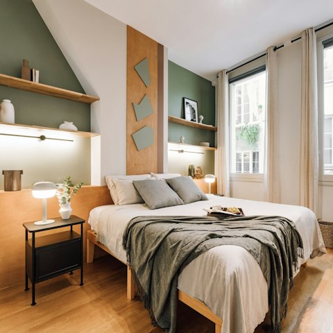Unwind in luxury in the stylish bedroom