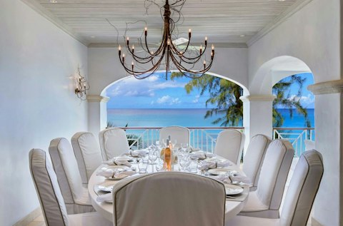 Gather around the table for a memorable feast overlooking the waves
