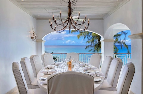 Gather around the table for a memorable feast overlooking the waves