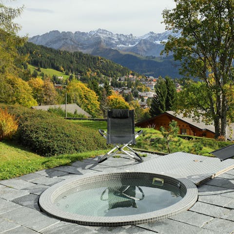 Feel the steam of your private outdoor whirlpool