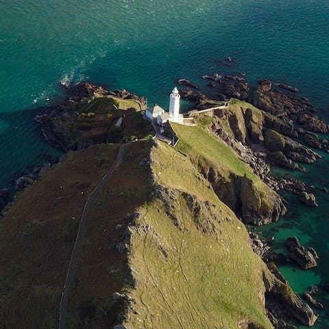 Put on your hiking boots and follow nearby hiking trails along the coast