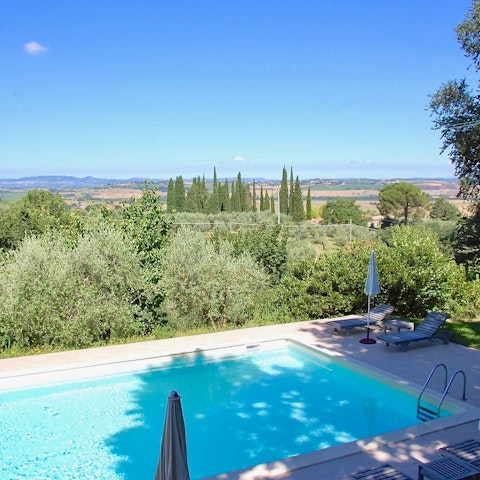 Soak up views across the Valdichiana Valley from the poolside
