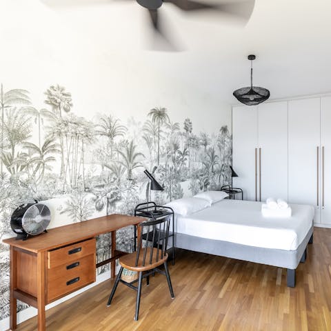 Catch up on work at the main bedroom's desk space