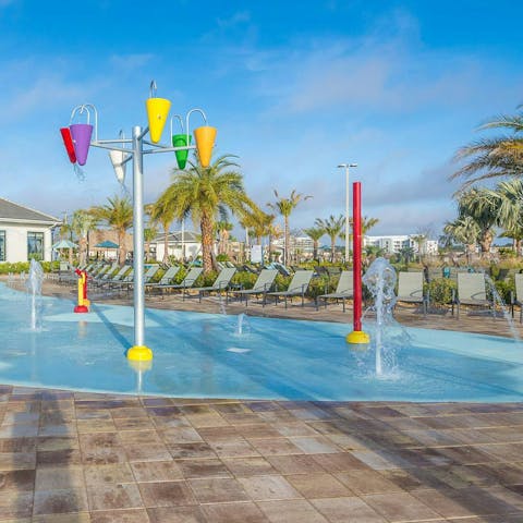 Have fun in the resort's splash pad