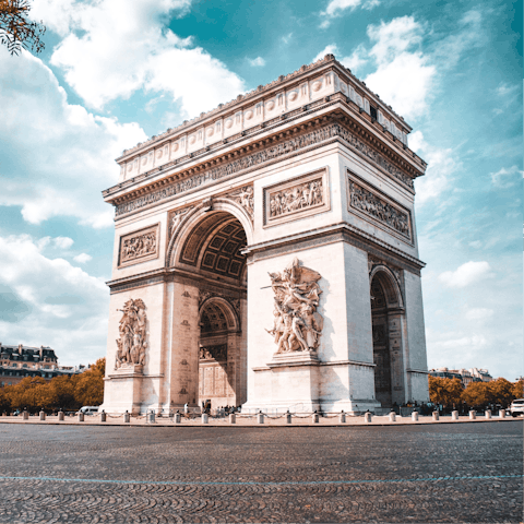 Saunter to the Arc de Triomphe, a twenty-minute walk away