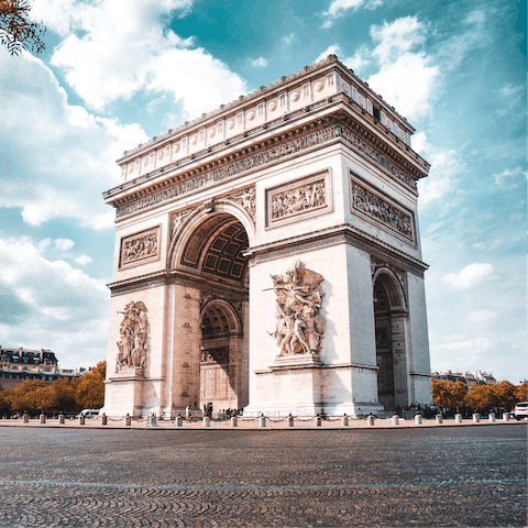 Saunter to the Arc de Triomphe, a twenty-minute walk away