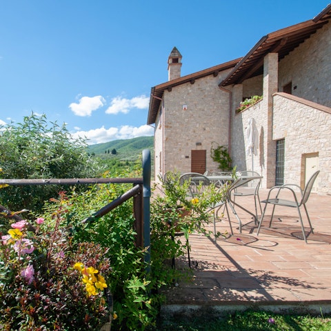 Enjoy an aperitif on the sunlit terrace