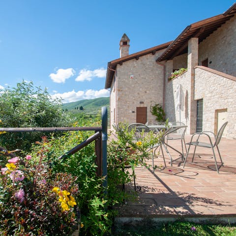 Enjoy an aperitif on the sunlit terrace