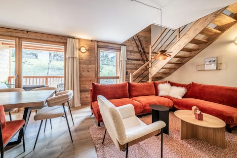 Curl up in the velvet corner sofa after a day on the slopes