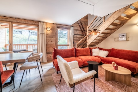 Curl up in the velvet corner sofa after a day on the slopes