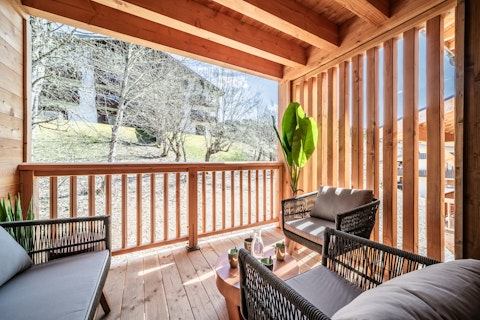 Pad out to the terrace and take in the alpine views