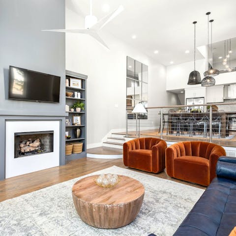 Enjoy the fourteen-foot ceilings in this airy living-dining area