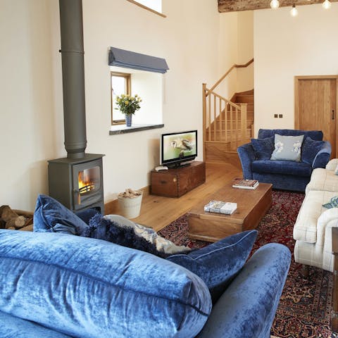 Spend evenings snuggled on the sofa while the log burner roars