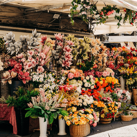 Pick up some flowers on Las Ramblas, a ten-minute walk from this home